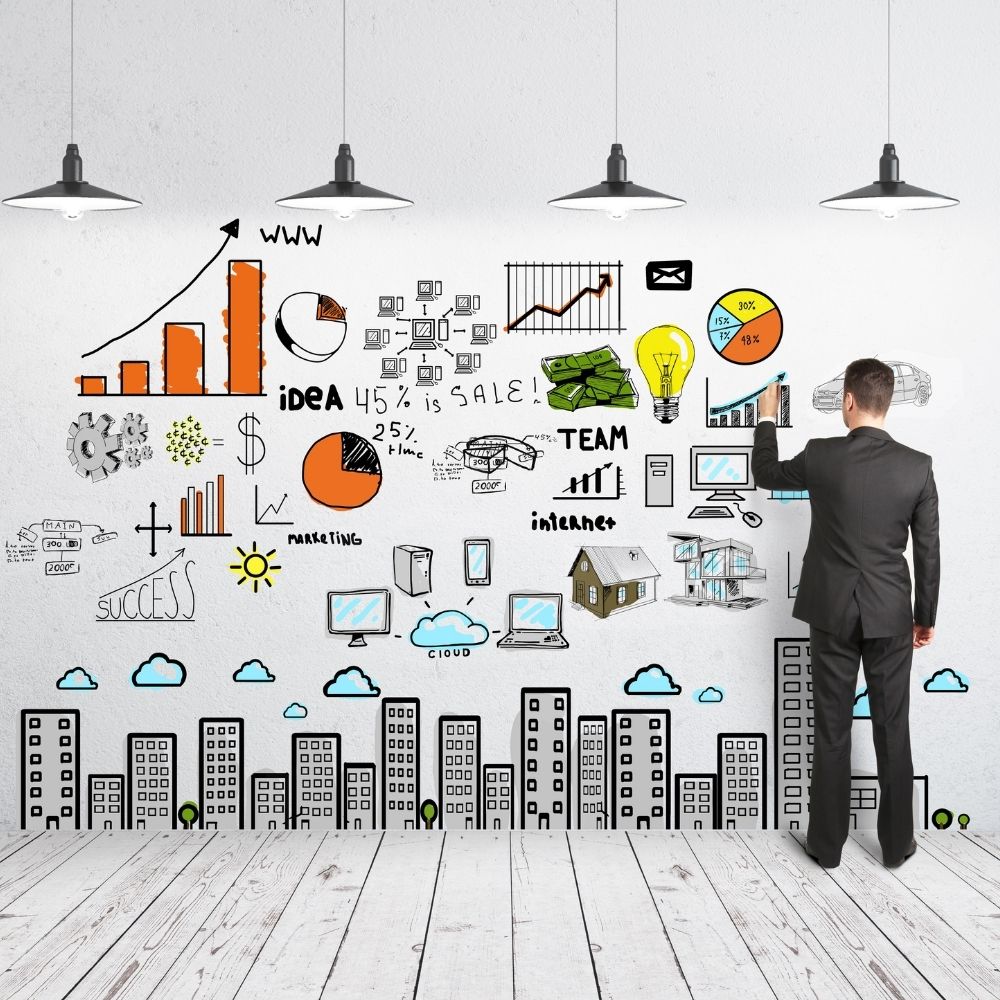 man drawing a business concept