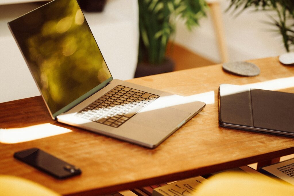 Laptop on a desk ready to be used 